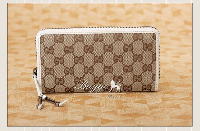 グッチ 財布 スーパーコピーグッチ ラウンドファスナー式財布 ベージュ×ダークブラウン 242635 FWCGN 8655 グッチ 財布 スーパーコピーグッチ ラウンドファスナー式財布 ベージュ×ダークブラウン 242635 FWCGN 8655