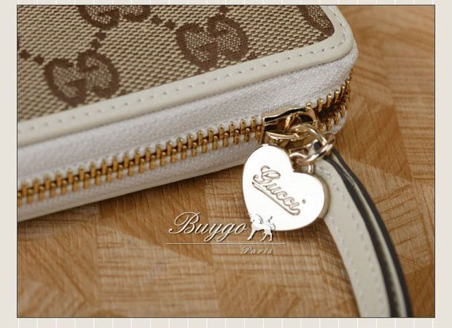 グッチ 財布 スーパーコピーグッチ 2010年秋冬新作 GGキャンバス ハートチャーム付きラウンドファスナー長財布 245914 FFPAG 9761 グッチ 財布 スーパーコピーグッチ 2010年秋冬新作 GGキャンバス ハートチャーム付きラウンドファスナー長財布 245914 FFPAG 9761