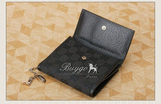 グッチ 財布 スーパーコピーグッチ 財布 グッチ チャーム付 Wホック 二つ折り財布 154182 F40IS 1000 GGキャンバス グッチ 財布 スーパーコピーグッチ 財布 グッチ チャーム付 Wホック 二つ折り財布 154182 F40IS 1000 GGキャンバス