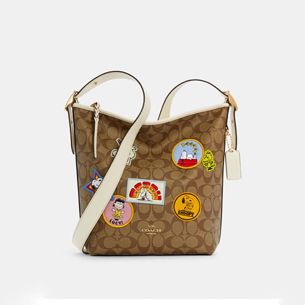 限定【コーチ】PEANUTSコラボ SNOOPY ヴァル ダッフル ショルダーコピー C4112 限定【コーチ】PEANUTSコラボ SNOOPY ヴァル ダッフル ショルダーコピー C4112